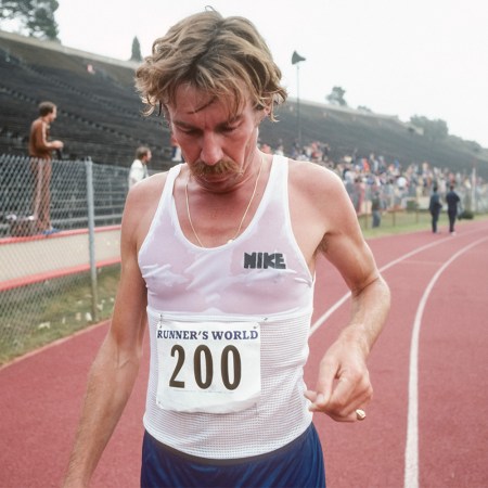 A runner with a drenched singlet, after a race.