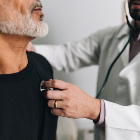 Doctor listening to a patient's heart