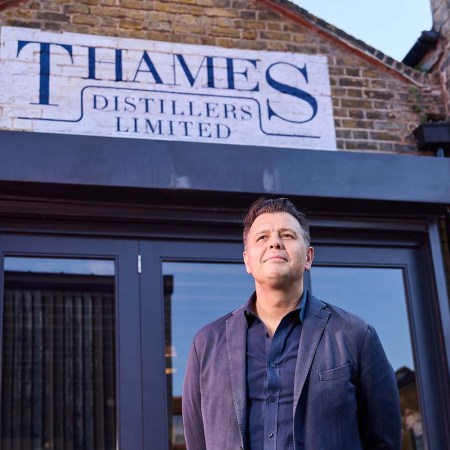 Simon Ford of Fords Gin in front the Thames Distillery