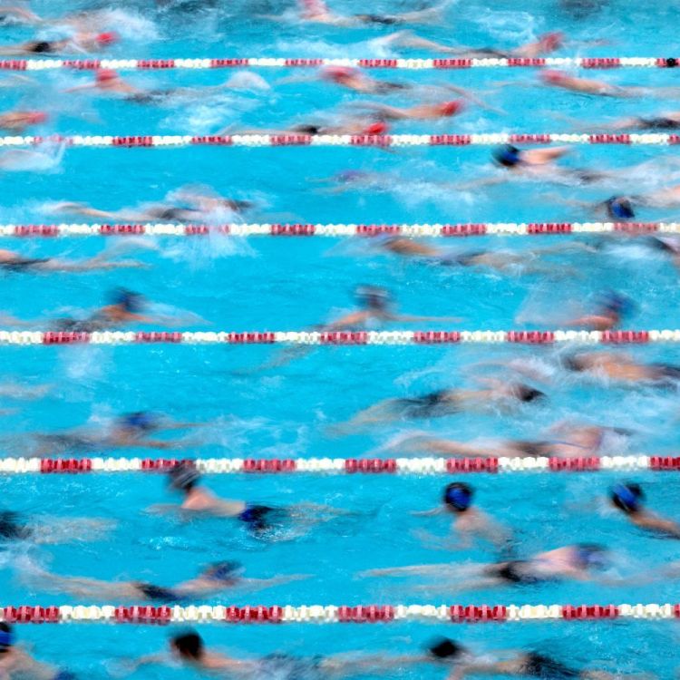 A crowded lap pool at a gym. Here's why our editor is never joining a gym again.