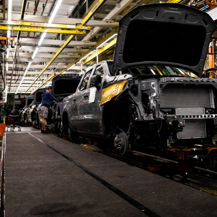 Trucks on assembly line