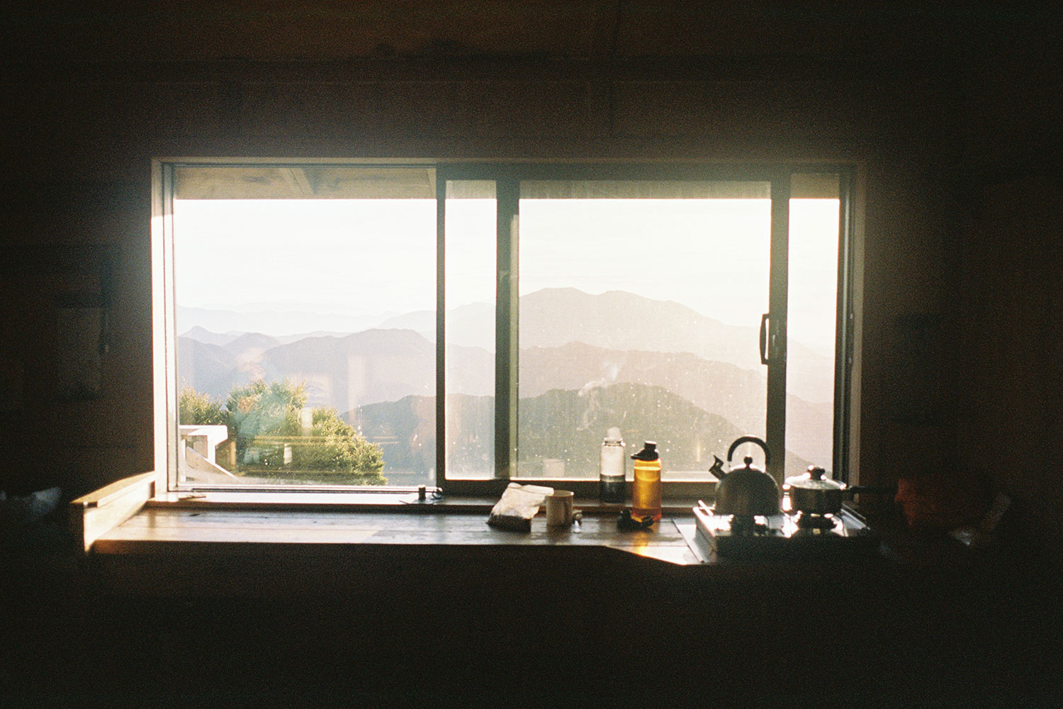 A view of the valleys through a kitchen window in the hut.