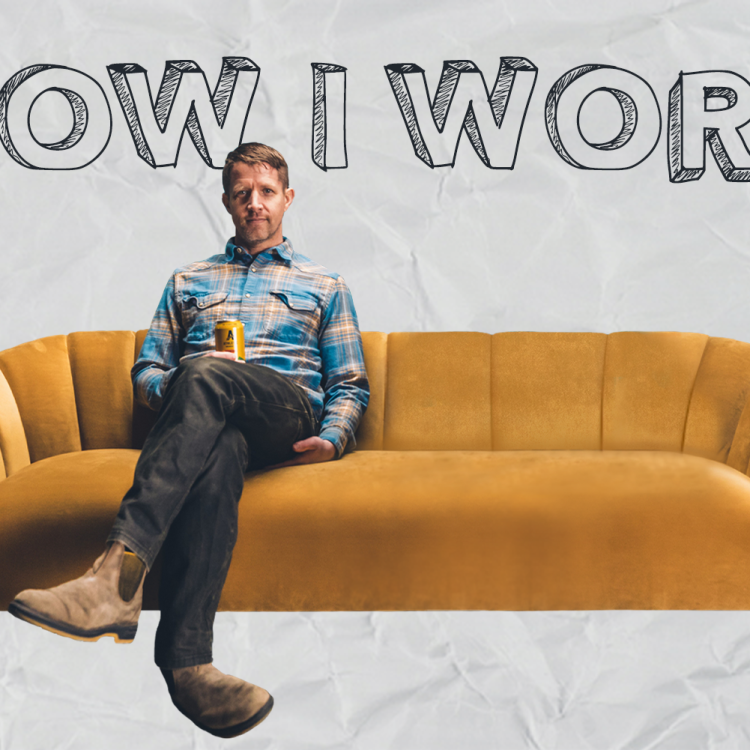 John Walker, the co-founder and COO of non-alcoholic brewery Athletic Brewing, sitting on a couch with the words "How I Work" behind him