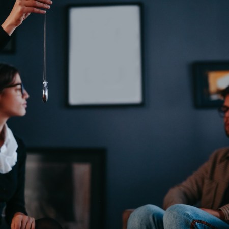 Therapist hypnotizing patient