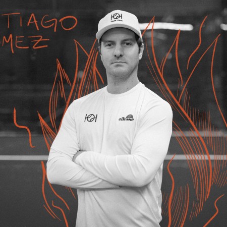 A profile shot of Santiago Gomez with illustrated flames.