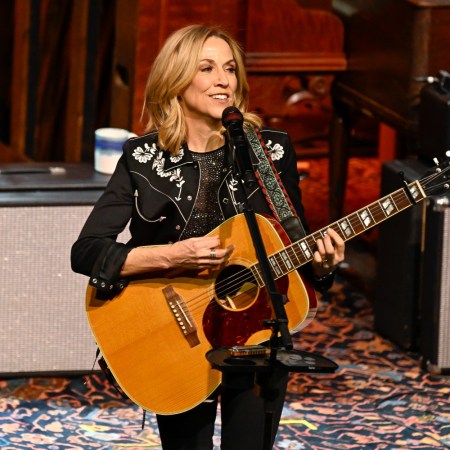 Sheryl Crow performing on stage