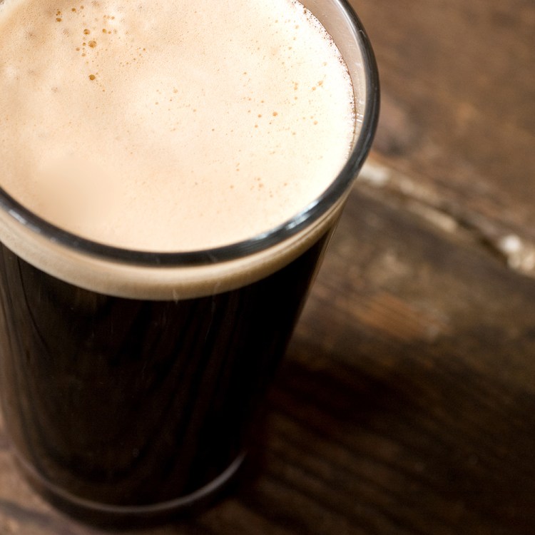 A can of nitro stout poured into a glass. If there's a Guinness shortage this St. Patrick's Day, here are some other beer options.